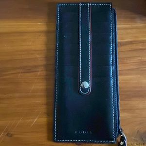 Lodis black wallet with 7 card slots and one for ID.